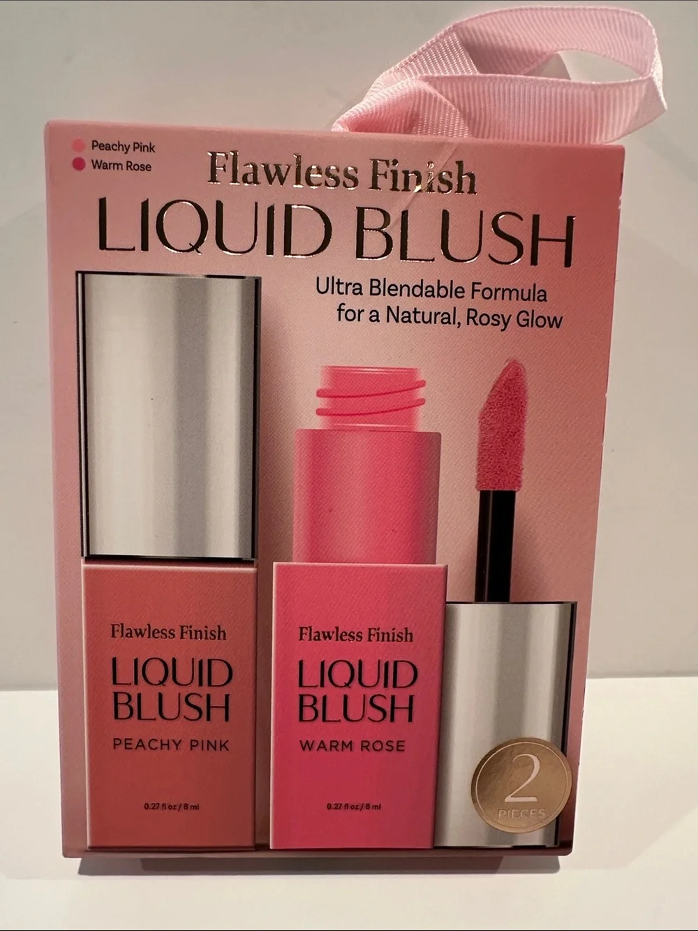 Flawless Finish Liquid Blush in Peachy Pink and Warm Rose.